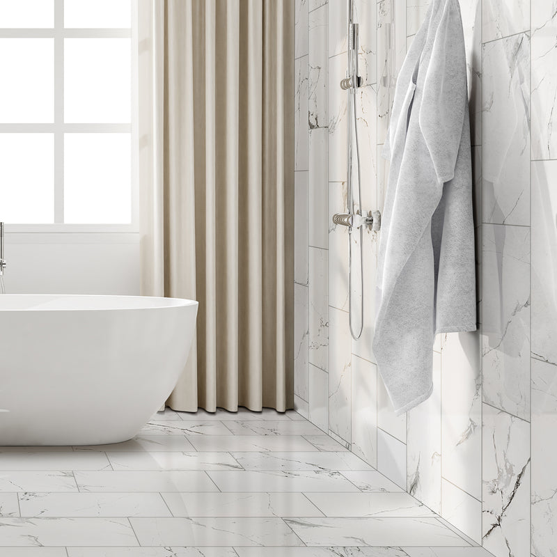 Carrara White 12"x24" Ceramic Floor and Wall Tile NHDCARWHI1224P - MSI Collection installed modern bath walls and floors with white bathtub