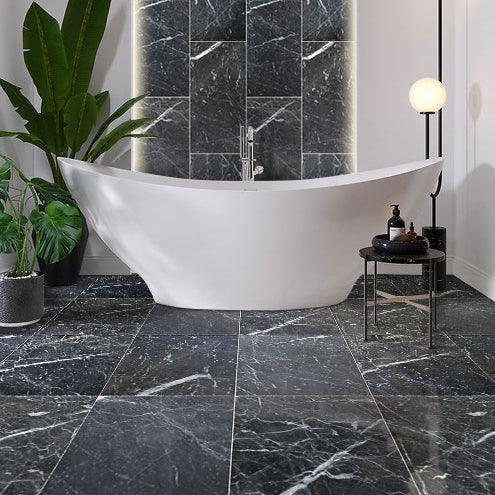 amanos black marble large format 24x24 installed on modern bathroom floor 18x36 installed walls close-up