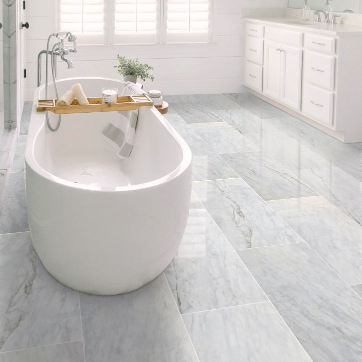 sugar white exotic marble 24x48 polished installed on bathroom floor white bathtub square view
