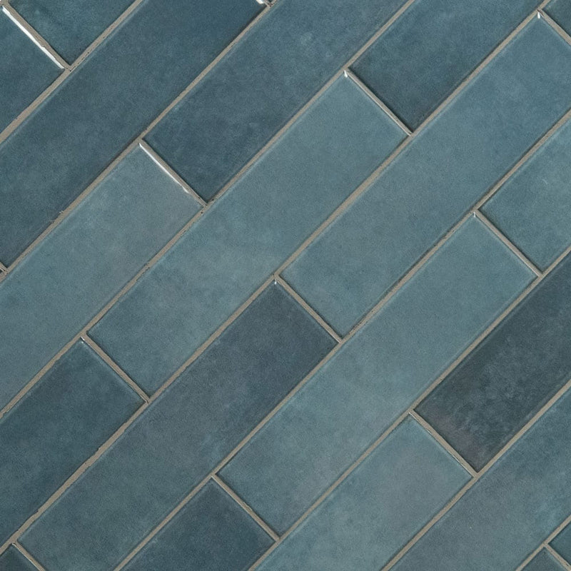 Renzo denim 3x12 glossy ceramic blue wall tile NRENDEN3X12 product shot multiple tiles angle view