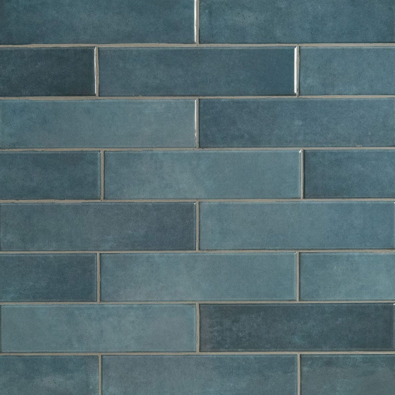 Renzo denim 3x12 glossy ceramic blue wall tile NRENDEN3X12 product shot multiple tiles top view