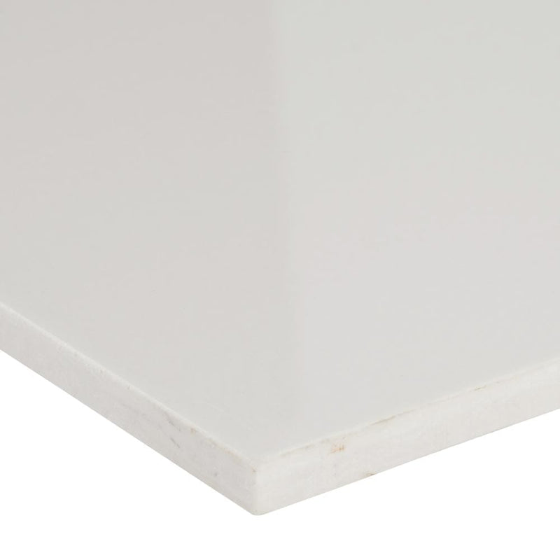 domino white polished porcelain floor and wall tile msi collection NWHI2424P product shot one tile profile view