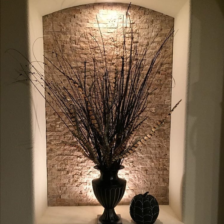 Noce brown travertine mosaic 1x2 stacked stone splitface DP 02-02 installed on decorative installation
