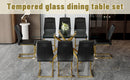 Table and chair set.Modern Luxurious Transparent Tempered Glass Dining Table Set with 8 Chairs.Single Fork Golden Metal Table Legs.Black high-quality PU dining chairs with golden metal legs.