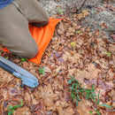 Woobie Hank: Insulated with USGI poncho-liner, serves as a large rag, knee pad, and adventure companion tool.