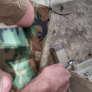 Woobie Hank: Insulated with USGI poncho-liner, serves as a large rag, knee pad, and adventure companion tool.