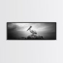 Coastal Pelican, Ocean Rock, Tranquil Wildlife Scene, Framed Canvas Print, Beach House Wall Art, Seaside Nature Decor, Moody Tones