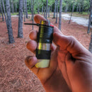 Survival Kit Lighter - Fire Starter outfitted with supplies.