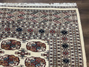 Pakistani Bokhara Rug 8x10, Traditional Turkoman Tribal Carpet, Allover Repeated Elephant Foot Motif, Ivory/Cream Black Red, Vintage Handmade