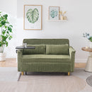 The pull-out and push-in green corduroy sofa with dual functions, equipped with a movable tabletop and USB ports, is suitable for use in living rooms and bedrooms.