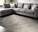 5' X 8' Silver Grey Machine Woven Abstract Brushstroke Indoor Area Rug