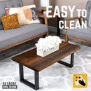 Skyline Boulder Black Solid Wood Coffee Table with 18 in. Landscape Legs