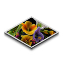 Midnight Bloom Glow Diamond Shaped Canvas Embossed Print with bold floral close-up, colorful petals on black, dramatic flower wall art