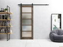 Quadro 4002 Cognac Oak Barn Door with Frosted Glass and Black Rail
