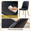 Table and chair set.Luxurious Snow Mountain White Slab Round Dining Table Set - 47'x47' with 4 Black PU Chairs with Simple Line Designs On The Backrest .Golden Metal Legs.