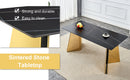 Table and chair set.63'x31.5x30'Black Texture With Lines Patterned Sintered Stone Table with Golden Stainless Steel Butterfly Legs.Paried With 4 Black High-quality PU Chairs With Golden Metal Legs.
