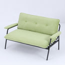 The 53-inch green sofa offers a spacious layout in the small apartment, easily handling various scenarios from watching movies to working