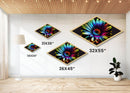 Neon Petal Burst Diamond Shaped Canvas Art Print with vibrant rainbow daisy, dark background floral decor, modern flower wall piece