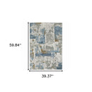 3' X 5' Grey Blue Navy Ivory And Brown Abstract Power Loom Stain Resistant Area Rug