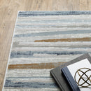 3' X 5' Grey Blue Ivory Brown Beige And Navy Abstract Power Loom Stain Resistant Area Rug
