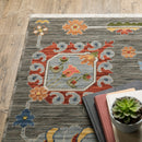 2' X 3' Grey Charcoal Yellow Blue Rust Red Pink Green And Ivory Oriental Power Loom Stain Resistant Area Rug With Fringe