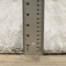 2' X 8' Ivory And Grey Geometric Shag Power Loom Stain Resistant Runner Rug
