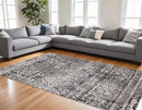 7' X 10' Gray Ivory And Taupe Abstract Stain Resistant Area Rug