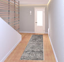 7' X 10' Gray Ivory And Taupe Abstract Stain Resistant Area Rug