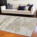 4' X 6' Ivory Tan And Gray Abstract Area Rug
