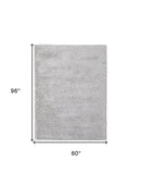 5' X 8' Ivory Shag Power Loom Stain Resistant Area Rug