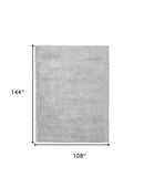 5' X 8' Ivory Shag Power Loom Stain Resistant Area Rug