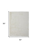 5' X 8' Ivory Shag Power Loom Stain Resistant Area Rug