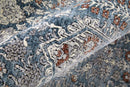 7' X 10' Blue And Ivory Floral Power Loom Stain Resistant Area Rug