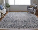 7' X 10' Blue And Ivory Floral Power Loom Stain Resistant Area Rug