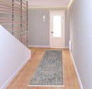 7' X 10' Blue And Ivory Floral Power Loom Stain Resistant Area Rug