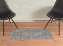 7' X 10' Blue And Ivory Floral Power Loom Stain Resistant Area Rug