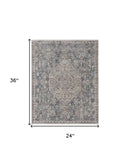 7' X 10' Blue And Ivory Floral Power Loom Stain Resistant Area Rug