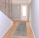 7' X 10' Blue Red And Gray Floral Power Loom Stain Resistant Area Rug