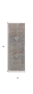 7' X 10' Blue Red And Gray Floral Power Loom Stain Resistant Area Rug