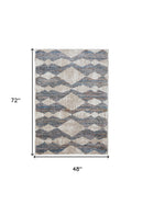 8' X 10' Ivory Gray And Blue Chevron Power Loom Stain Resistant Area Rug
