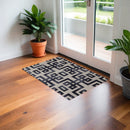 8' X 11' Ivory And Black Wool Tufted Handmade Area Rug