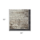 5' X 8' Beige Abstract Distressed Area Rug