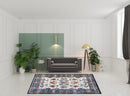 8' X 10' Ivory Brown and Orange Floral Power Loom Area Rug