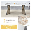 Table and chair set.63'x31.5x30' Luxurious Pandora patterned Sintered Stone Tabletop with Silver Stainless Steel Butterfly Legs.Paried With 6 Dark Gray High-quality PU Chairs With Arched Metal Legs.