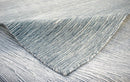 Solid Blue and Silver Wool And Viscose 5x8 Area Rug