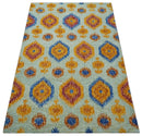 5x8 Ivory, Gold and Blue Traditional Ikat design Hand Tufted Wool Area Rug