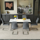 Table and chair set.63*31.4 Inch Luxurious Cold Jade Sintered Stone Dining Table Set- 6 Dark Gray High-quality PU Chairs With Arched Silver Metal Legs.Perfect For Dinner Room,Meeting Room,Kitchen,etc.