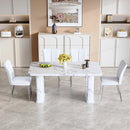 Table and chair set.64.5x35.4 Inch Stylish White Marble Textured Dining Table.Paried With 4 White PU Chairs with a vertical stripe design on the backrest.Create Your Exclusive Low-Key Luxury Space.