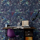 Pastel Color Tropical Leaves In a Dark Jungle Background Wallpaper