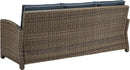 Brown Wicker Outdoor Sofa with Navy Cushions for Comfort